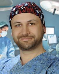 Op. Dr. Arif Eroğlu